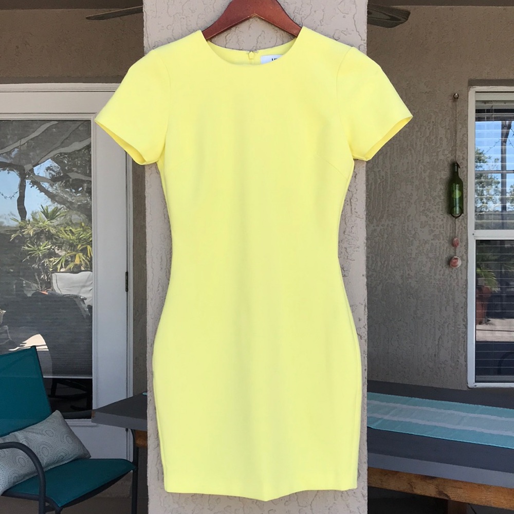 Likely, bright yellow fitted dress. Size 0